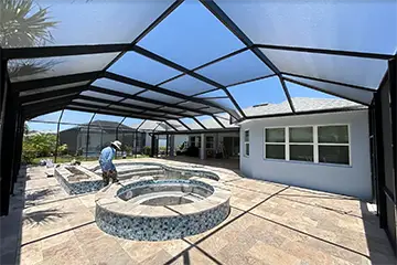 Mansard pool enclosure by East Coast Alumihnum